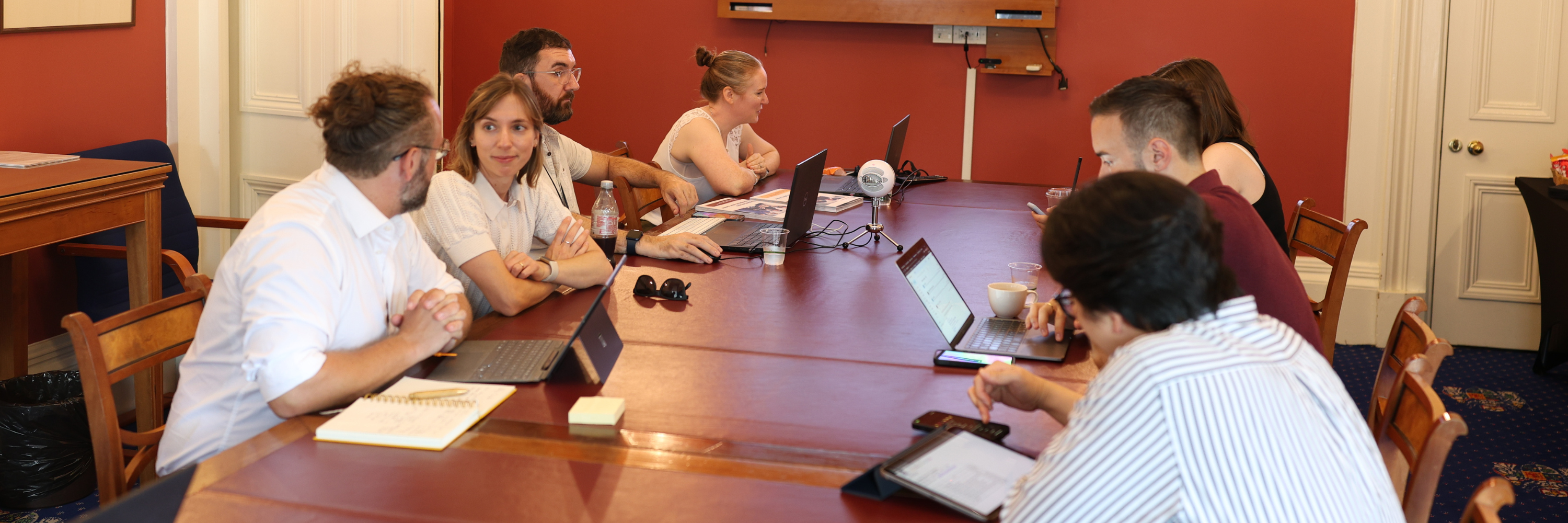 Resident Doctors' Committee meeting in full swing. Group of people sitting around conference table